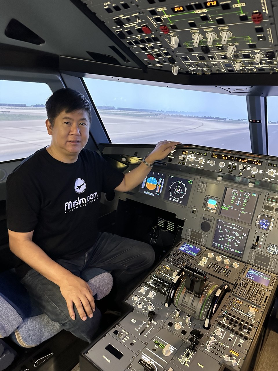 Fabian Lim in A320 flight simulator cockpit
